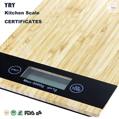Taylor bamboo digital kitchen scale with 11 lb / 5 kg capacity, backlit LCD display, and tare function. Weighs dry and liquid ingredients in oz, g, fl oz, and ml. Eco-friendly bamboo platform.